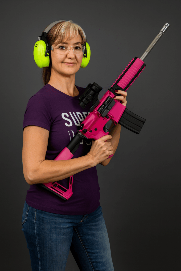 Woman with pink AR-15 at the range
